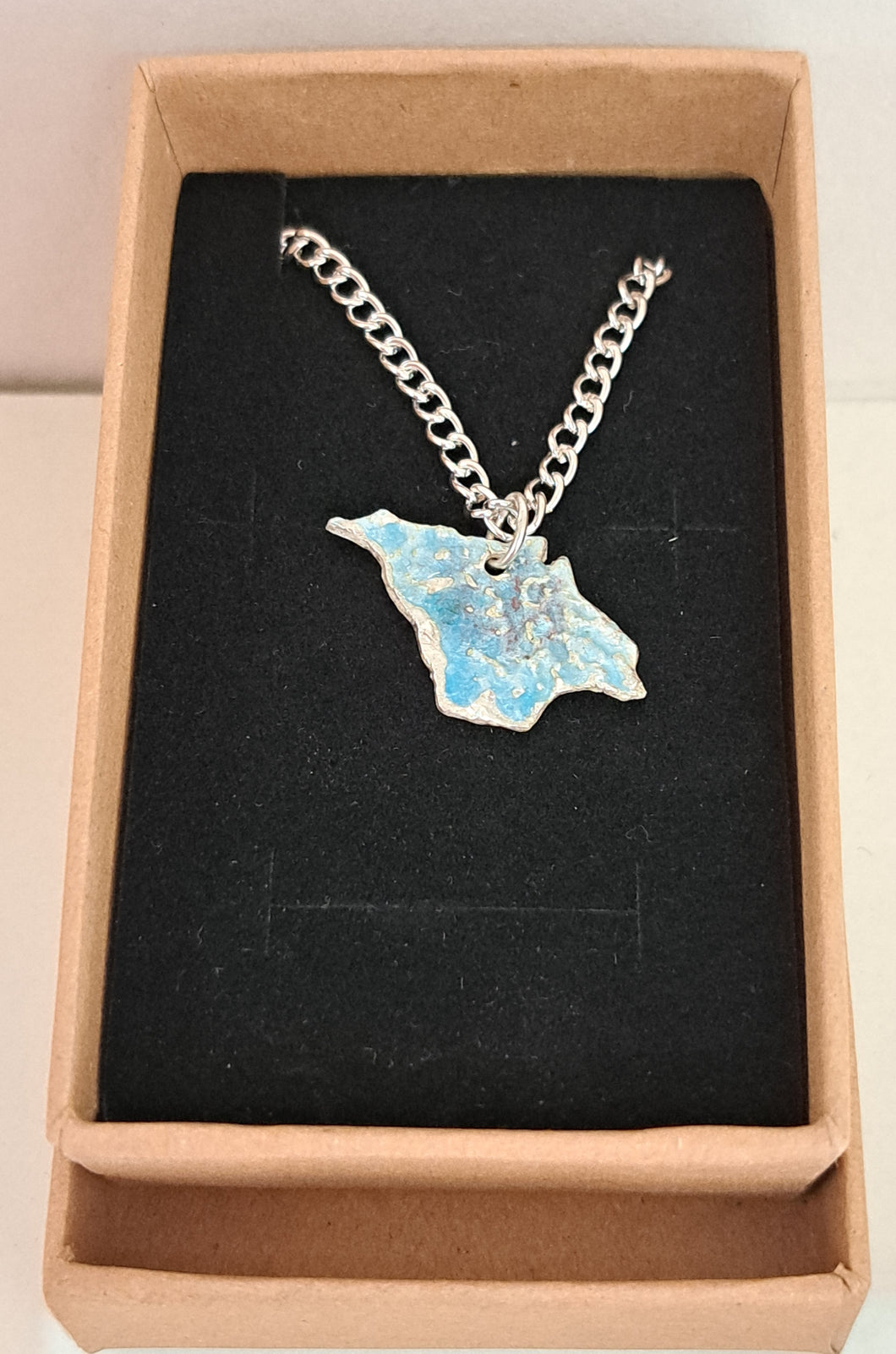 Silver Isle of Wight necklace with a blue enamel glaze