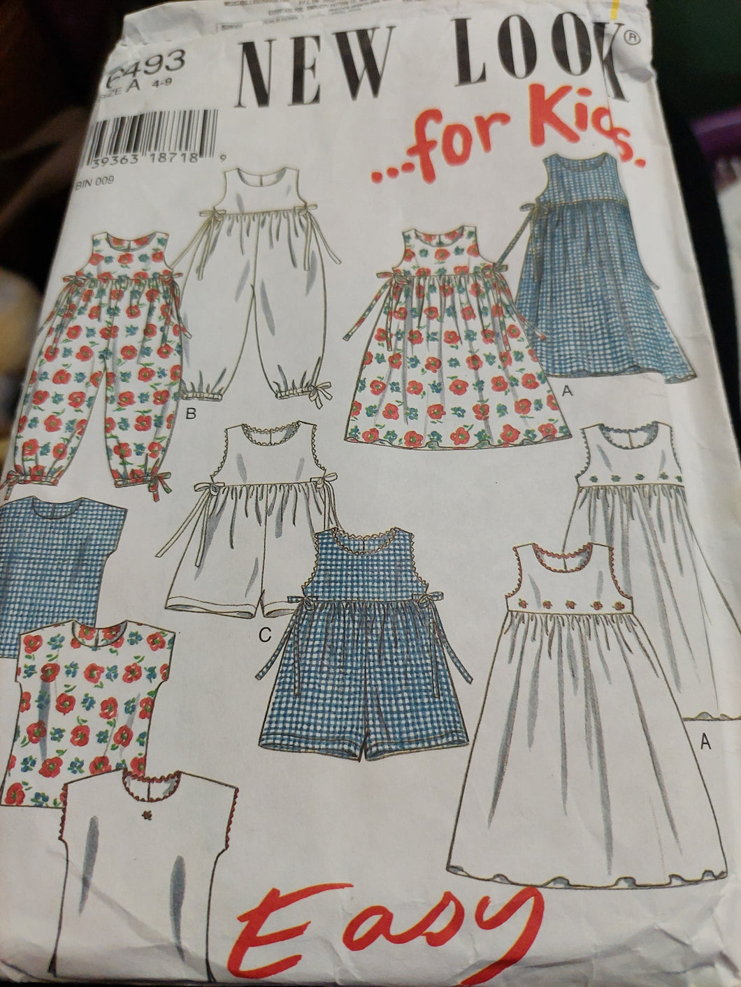 Newlook 6493 - Child Dress and Romper Sewing Pattern - Size 4-9